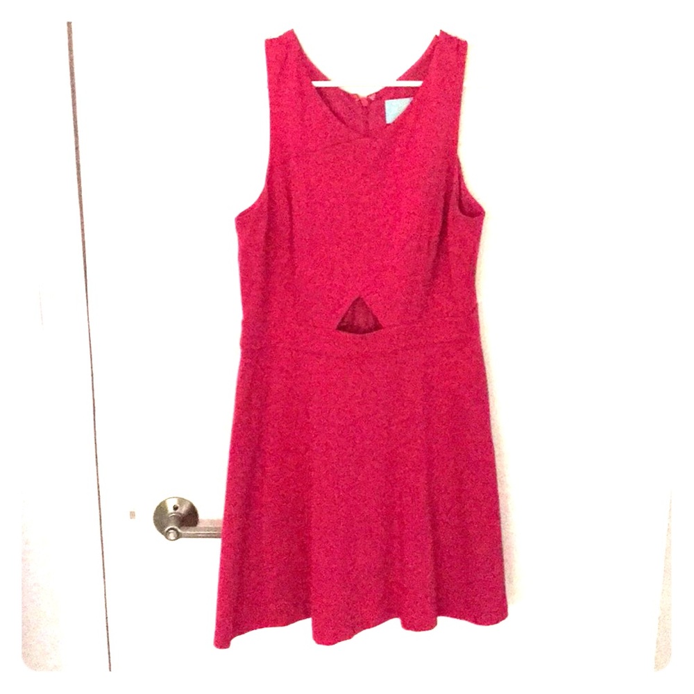 Pink fit and flare with middle cut out.